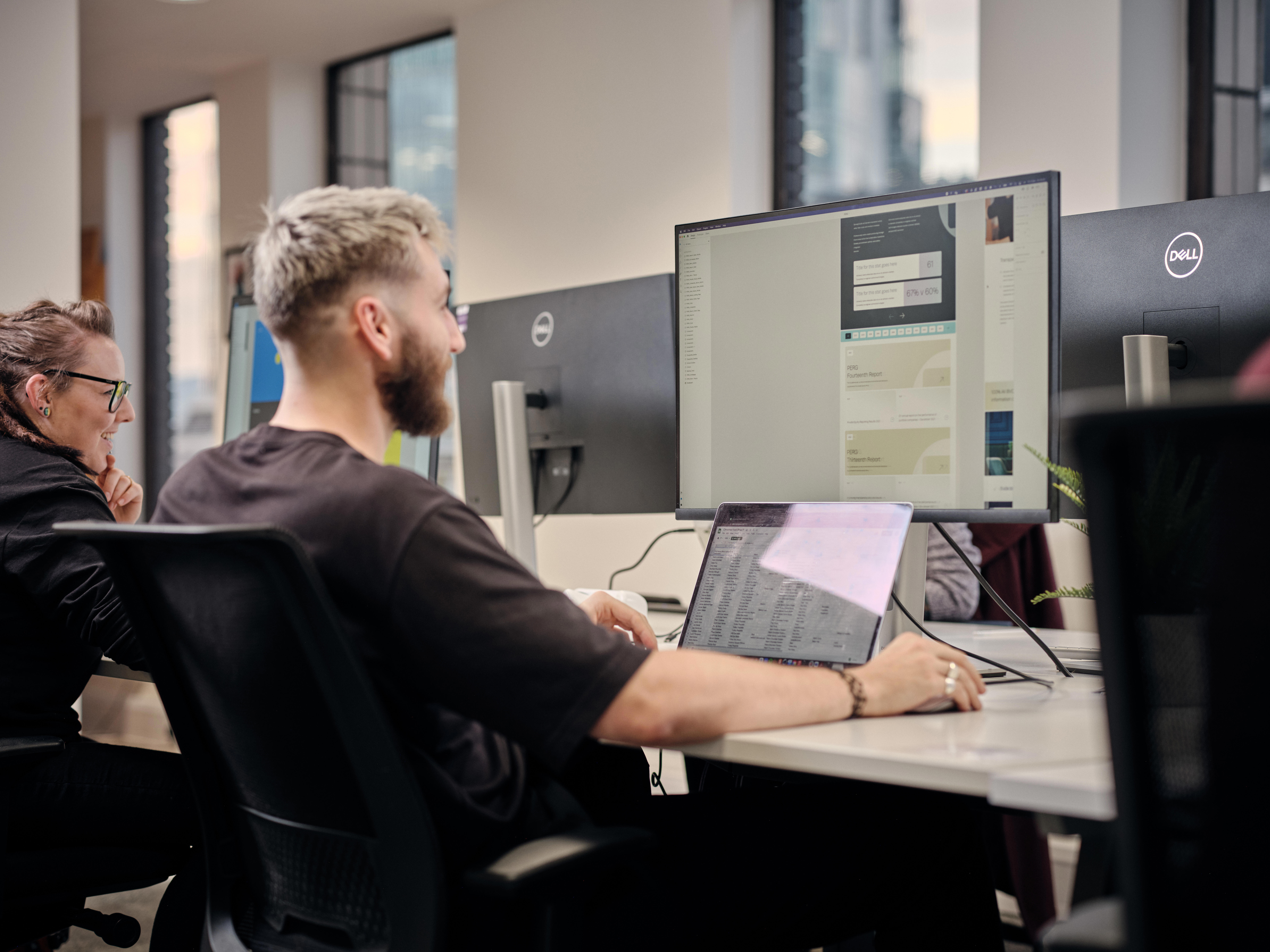 Cantarus team member working on a pc
