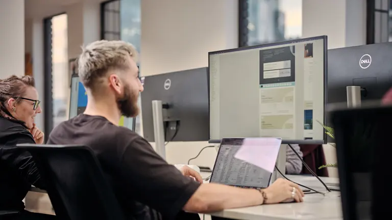 Cantarus team member working on a pc