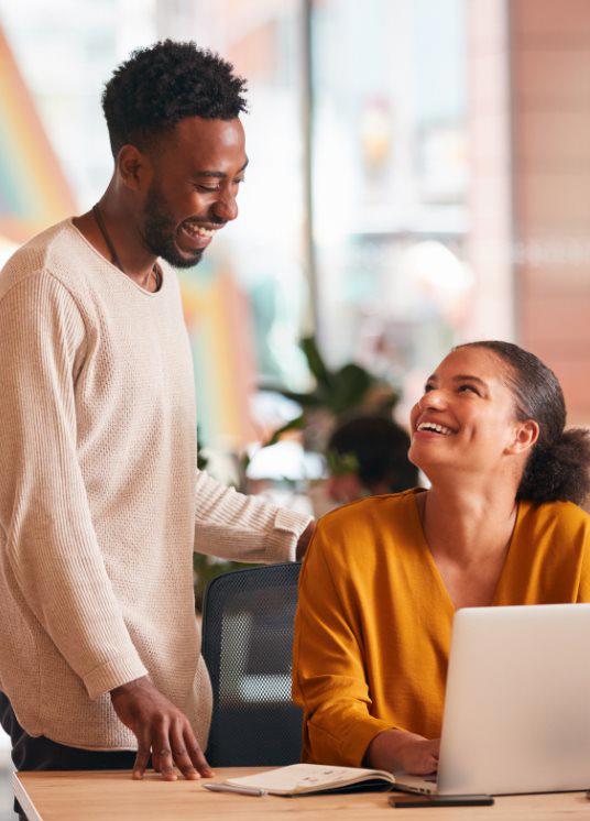 two people collaborating in a modern office