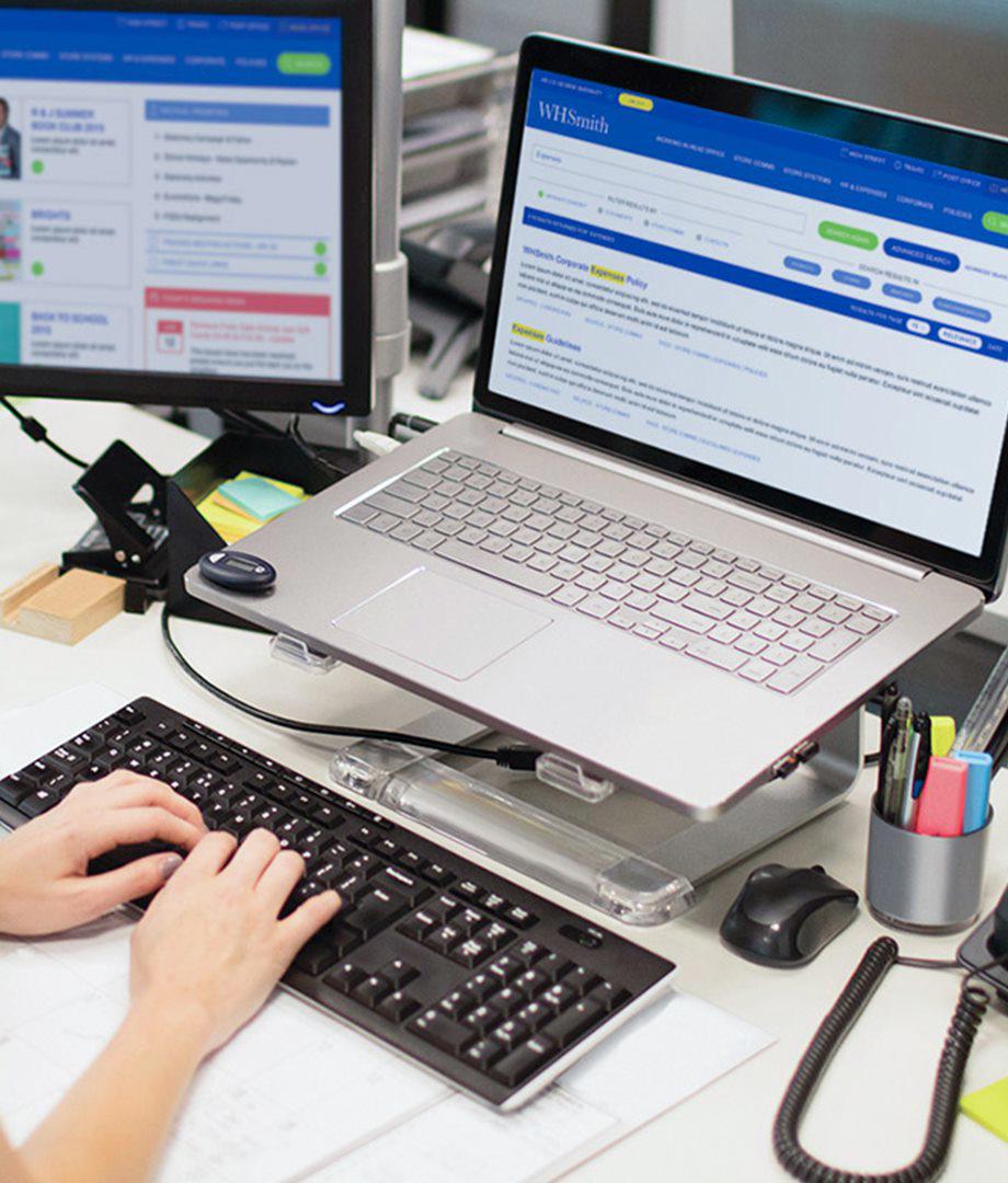person typing on laptop